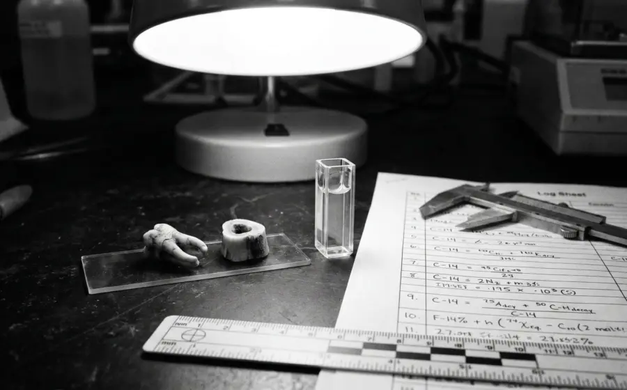 Carbon-14 dating reading time from bone, tooth, and hair